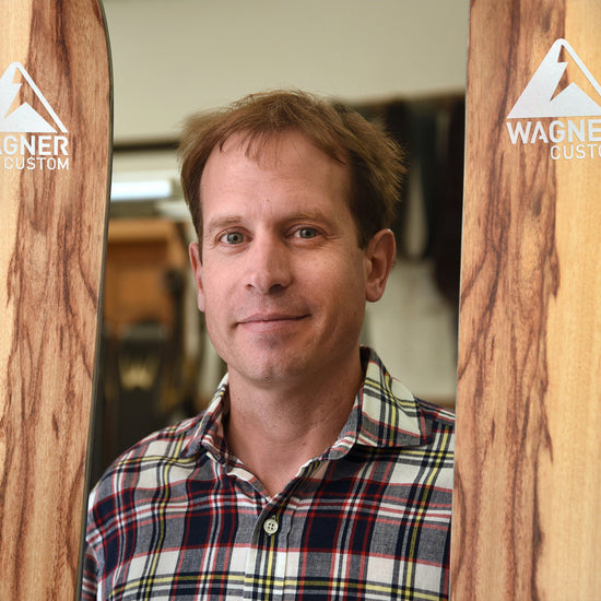 Pete Wagner poses with a pair of skis.