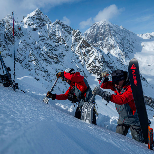 Tordrillo guides dig avalanche pits to test for stability.