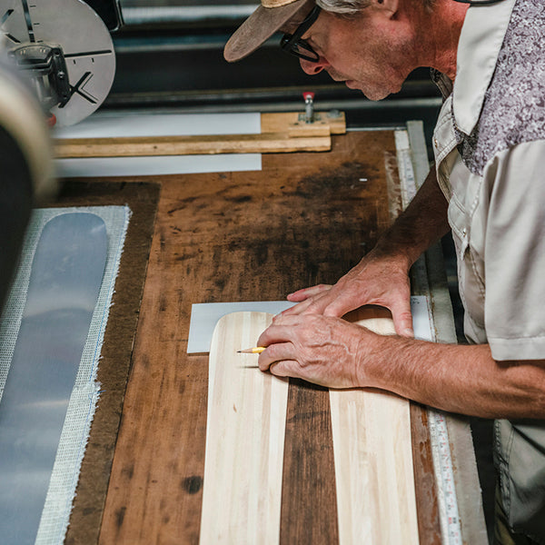 A Wagner Custom Skis employee builds skis at the factory.